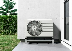 Une pompe à chaleur écologique sur pied, posée sur une terrasse