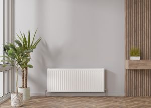 Un radiateur blanc dans une pièce